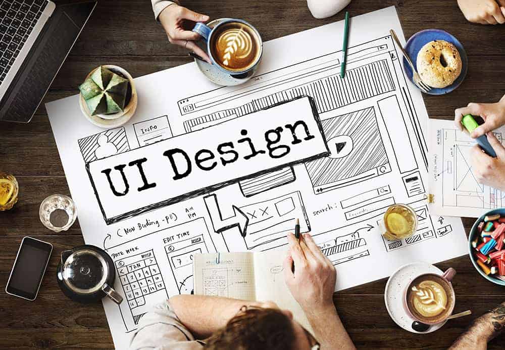 people having a meeting on UI design